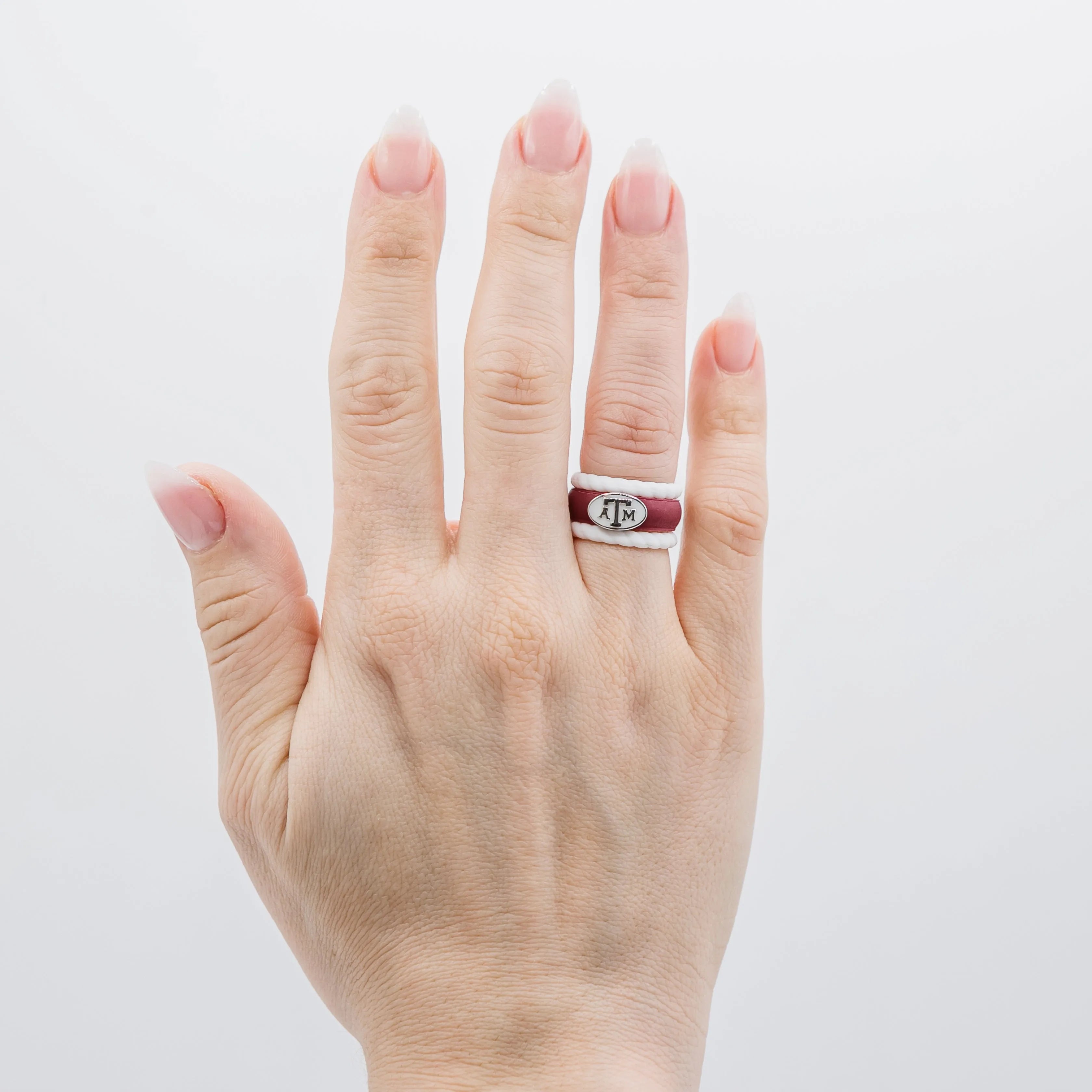 Texas A&M Aggie Silicone Rings on hands