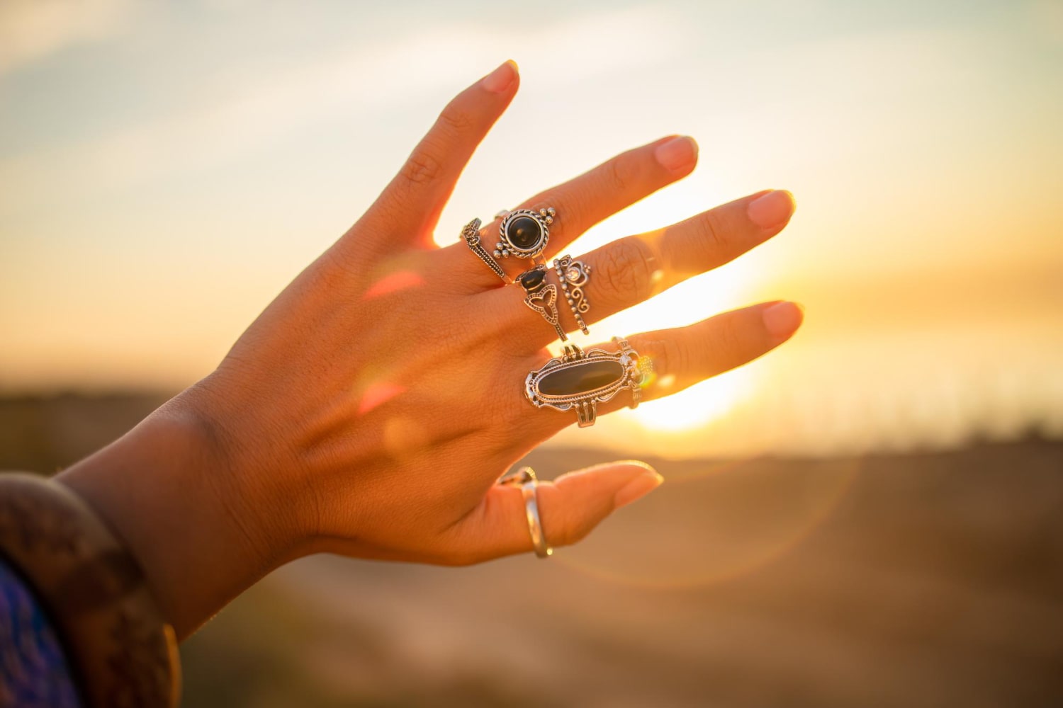 Meaningful jewelry rings in warm sunset light
