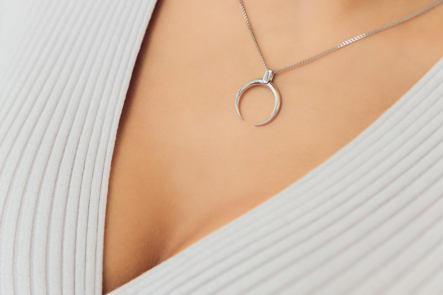 Minimal ring necklace worn on chain