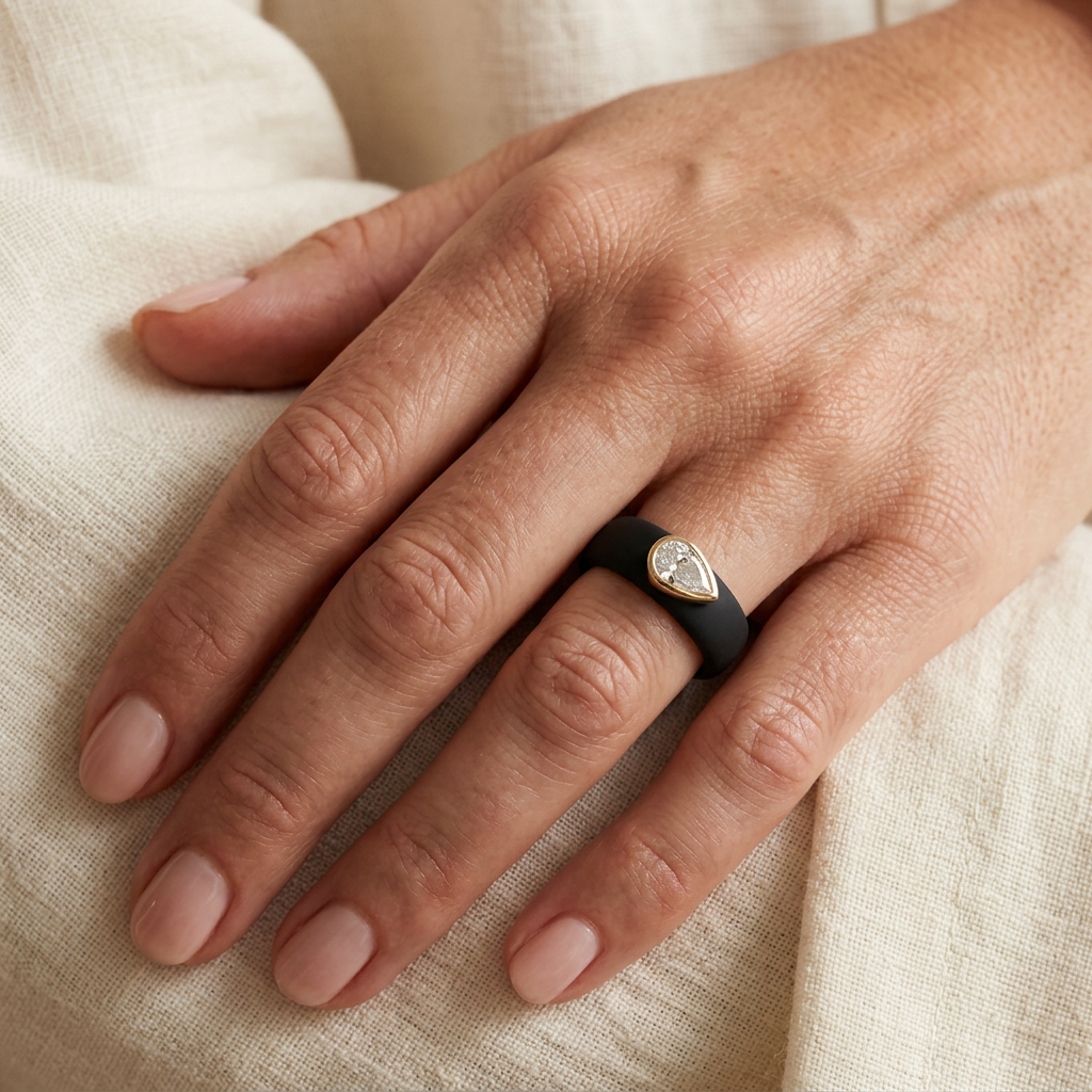Pear ring worn on a finger